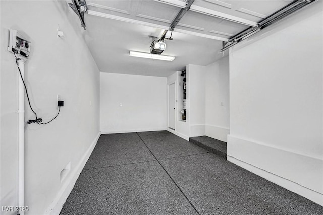 9078 Hilverson Ave, Las Vegas, NV 89148 - garage with a garage door opener and baseboards