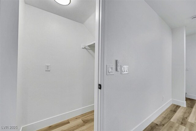 9078 Hilverson Ave, Las Vegas, NV 89148 - washroom with light wood-style floors and baseboards
