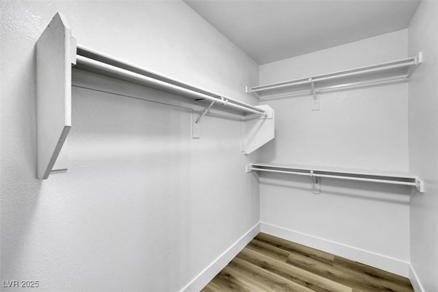 9078 Hilverson Ave, Las Vegas, NV 89148 - walk in closet with wood finished floors