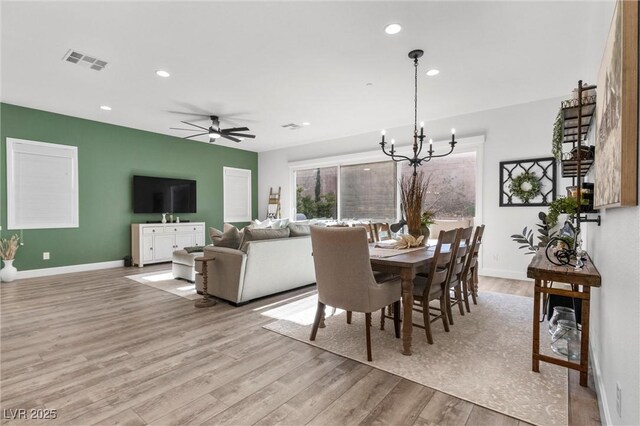 8705 Fordster St, Las Vegas, NV 89166 - dining space featuring a chandelier, light wood finished floors, recessed lighting, baseboards, and ceiling fan