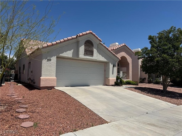 2904 Channel Bay Dr, Las Vegas, NV 89128 - mediterranean / spanish home with concrete driveway, an attached garage, stucco siding, a tiled roof, and cooling unit