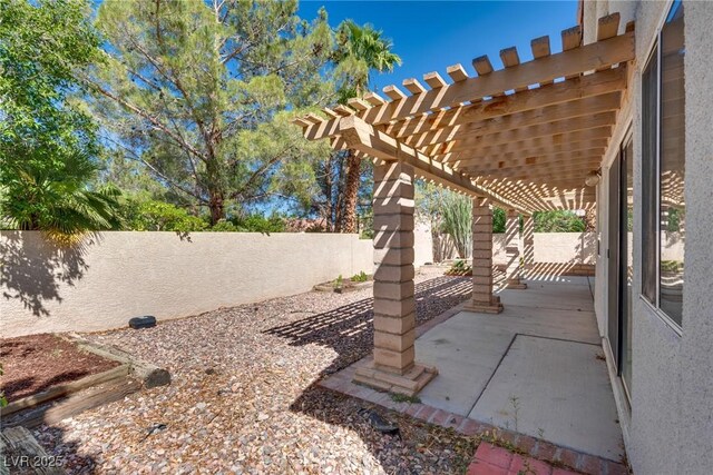 2904 Channel Bay Dr, Las Vegas, NV 89128 - fenced backyard with a patio and a pergola