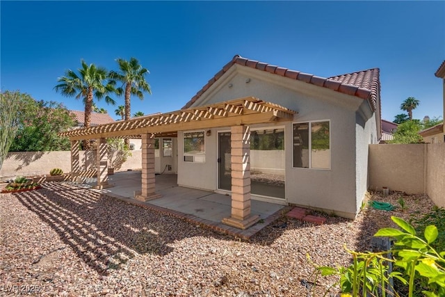 2904 Channel Bay Dr, Las Vegas, NV 89128 - rear view of house featuring a tile roof, stucco siding, and a patio