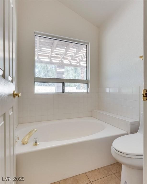2904 Channel Bay Dr, Las Vegas, NV 89128 - bathroom with a garden tub, tile patterned floors, plenty of natural light, and vaulted ceiling