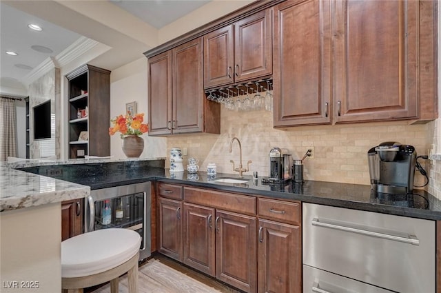 748 Puerto Real Ct, Las Vegas, NV 89138 - kitchen featuring ornamental molding, dark stone countertops, a sink, wine cooler, and tasteful backsplash