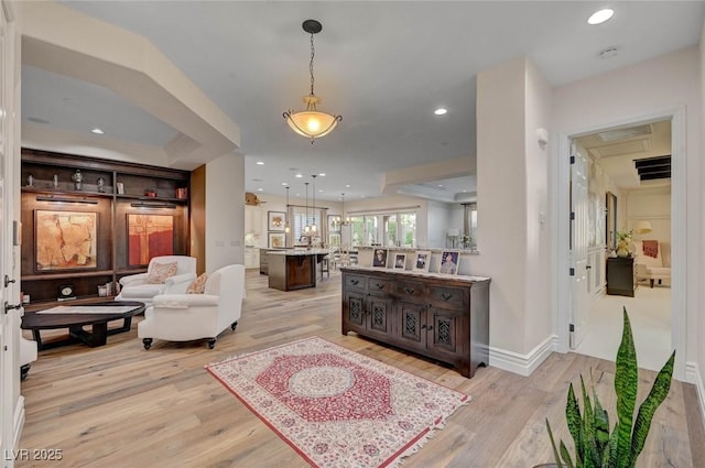 748 Puerto Real Ct, Las Vegas, NV 89138 - living room with light wood-type flooring, recessed lighting, and baseboards