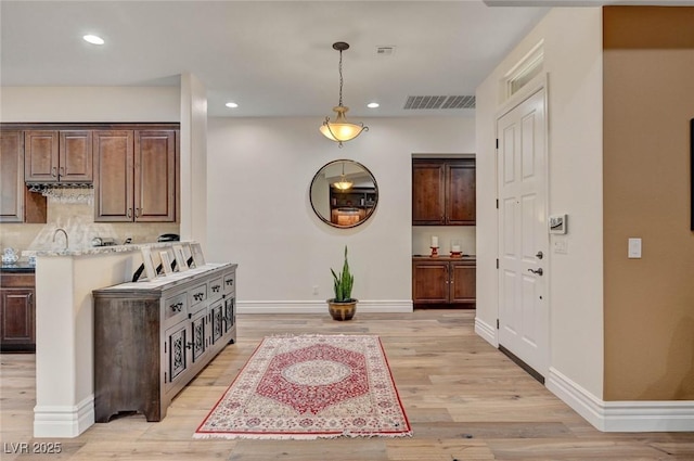 748 Puerto Real Ct, Las Vegas, NV 89138 - foyer with light wood-style floors, baseboards, and recessed lighting