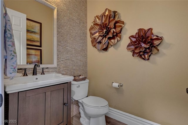 748 Puerto Real Ct, Las Vegas, NV 89138 - bathroom featuring toilet, vanity, and wood finished floors
