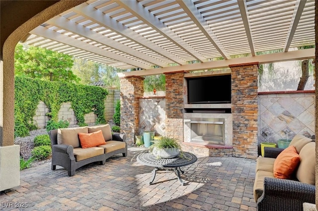 748 Puerto Real Ct, Las Vegas, NV 89138 - view of patio / terrace featuring an outdoor living space with a fireplace
