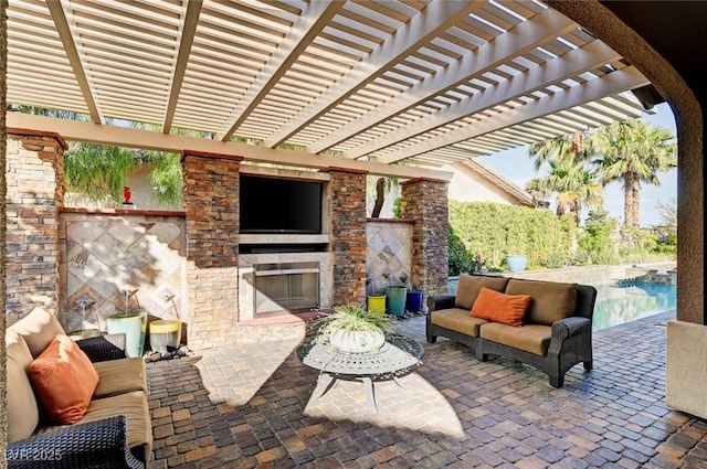 748 Puerto Real Ct, Las Vegas, NV 89138 - view of patio / terrace with an outdoor living space with a fireplace