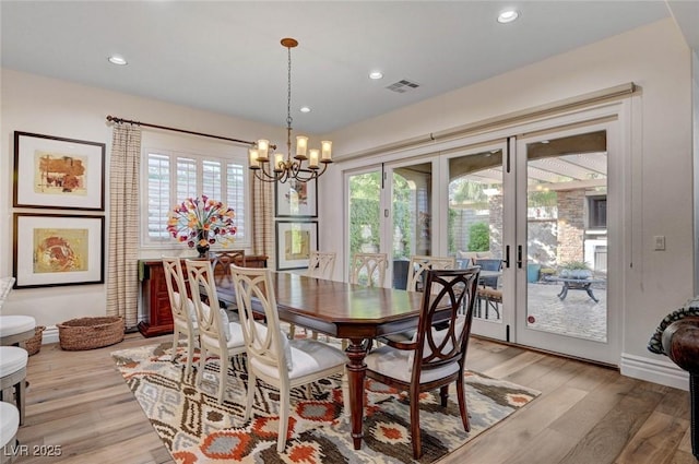 748 Puerto Real Ct, Las Vegas, NV 89138 - dining area featuring french doors, light wood-style floors, recessed lighting, a chandelier, and baseboards
