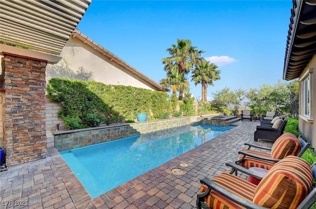 748 Puerto Real Ct, Las Vegas, NV 89138 - view of swimming pool with a patio area, a hot tub, and a fenced backyard