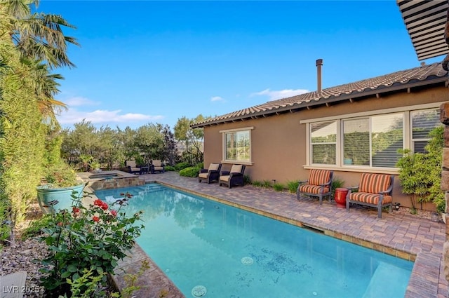 748 Puerto Real Ct, Las Vegas, NV 89138 - view of swimming pool with a patio area and a pool with connected hot tub