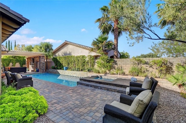 748 Puerto Real Ct, Las Vegas, NV 89138 - view of pool with an in-ground hot tub, a patio area, and a fenced backyard