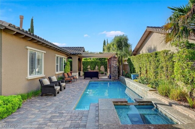 748 Puerto Real Ct, Las Vegas, NV 89138 - view of pool featuring a pergola, a patio area, an outdoor hangout area, and a pool with connected hot tub