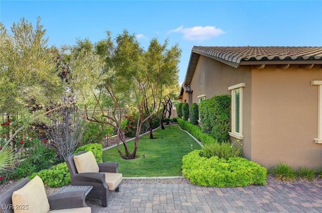 748 Puerto Real Ct, Las Vegas, NV 89138 - view of green lawn featuring a patio