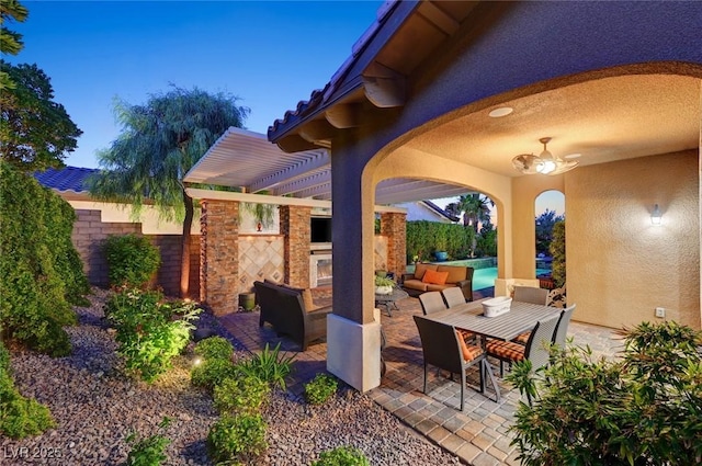 748 Puerto Real Ct, Las Vegas, NV 89138 - fenced backyard featuring a patio and an outdoor living space