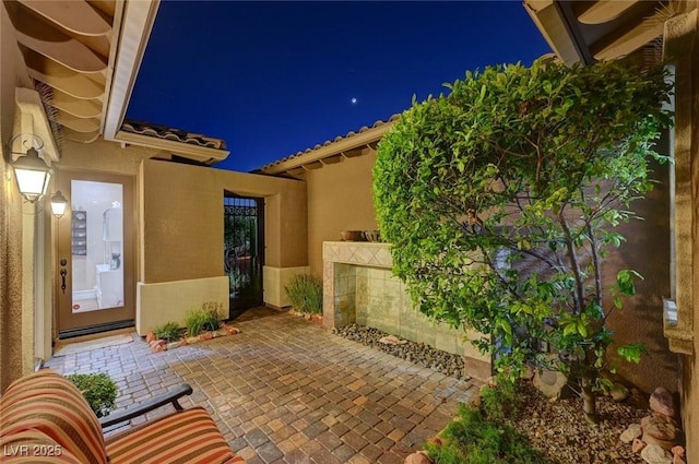 748 Puerto Real Ct, Las Vegas, NV 89138 - patio at twilight with a patio