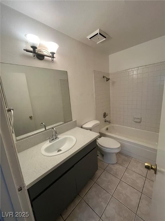 3585 Arville St Unit 403A, Las Vegas, NV 89103 - bathroom featuring tile patterned floors, vanity, toilet, and shower / tub combination