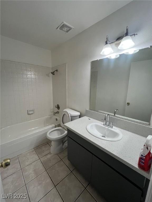 3585 Arville St Unit 403A, Las Vegas, NV 89103 - bathroom featuring tile patterned flooring, vanity, shower / bathtub combination, and toilet