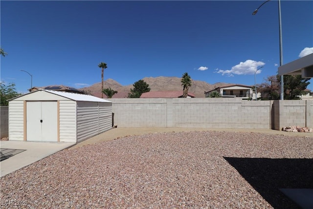 878 Samoy St, Las Vegas, NV 89110 - fenced backyard featuring a mountain view