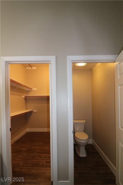 878 Samoy St, Las Vegas, NV 89110 - bathroom featuring wood finished floors, baseboards, and toilet