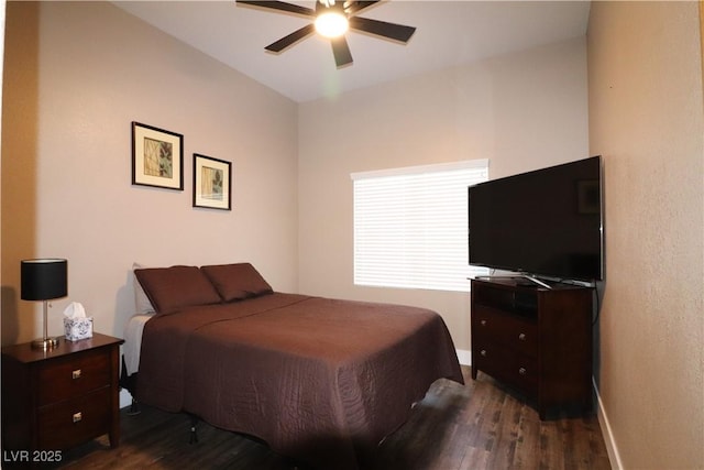 878 Samoy St, Las Vegas, NV 89110 - bedroom with dark wood-style flooring, baseboards, and ceiling fan