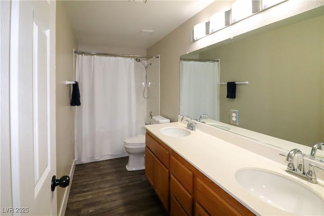878 Samoy St, Las Vegas, NV 89110 - bathroom with double vanity, toilet, and wood finished floors