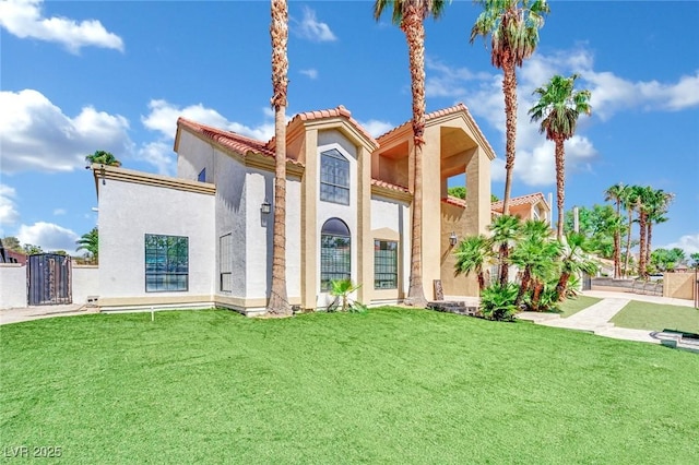 2131 Diamond Bar Dr, Las Vegas, NV 89117 - rear view of house featuring stucco siding, a tiled roof, and a gate