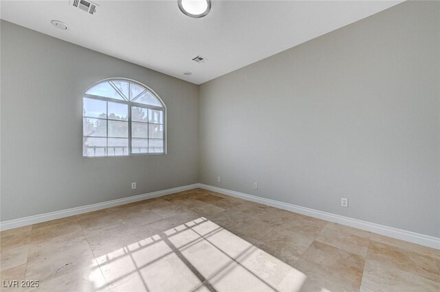 10518 Santerno St, Las Vegas, NV 89141 - tiled empty room with baseboards