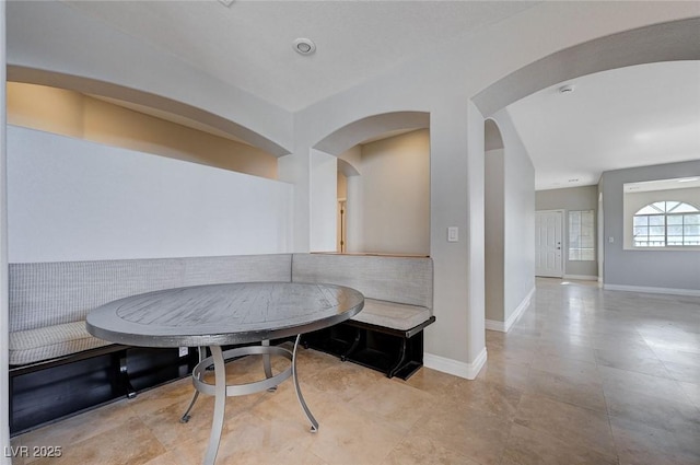 10518 Santerno St, Las Vegas, NV 89141 - dining space featuring arched walkways and baseboards