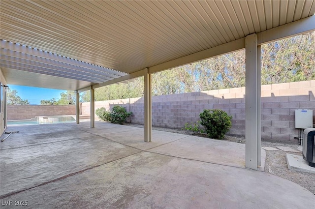 10518 Santerno St, Las Vegas, NV 89141 - fenced backyard featuring a patio