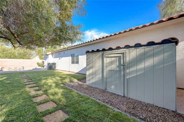 10518 Santerno St, Las Vegas, NV 89141 - view of yard featuring central AC unit