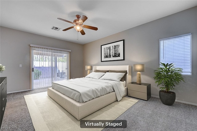 10518 Santerno St, Las Vegas, NV 89141 - bedroom with access to outside, carpet flooring, baseboards, and a ceiling fan