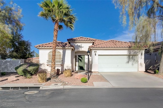 10518 Santerno St, Las Vegas, NV 89141 - mediterranean / spanish house featuring a garage, stucco siding, a tile roof, and concrete driveway