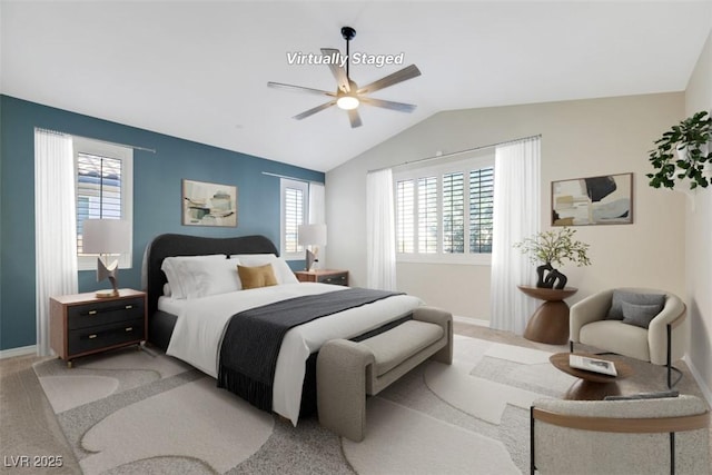 234 Polaris Ridge Ave, Henderson, NV 89011 - bedroom featuring vaulted ceiling, multiple windows, light carpet, and baseboards
