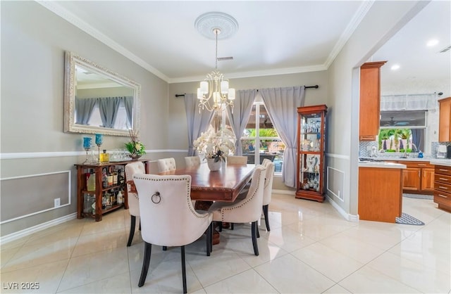 5872 Revital Ct, Las Vegas, NV 89131 - dining space featuring a chandelier, light tile patterned floors, ornamental molding, and baseboards