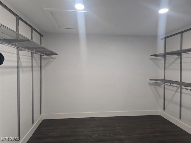 945 Vegas Valley Dr, Las Vegas, NV 89109 - spacious closet featuring dark wood finished floors