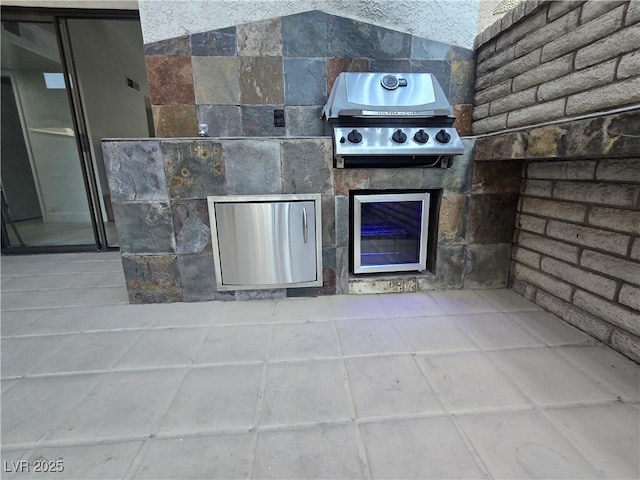 945 Vegas Valley Dr, Las Vegas, NV 89109 - view of patio featuring a grill