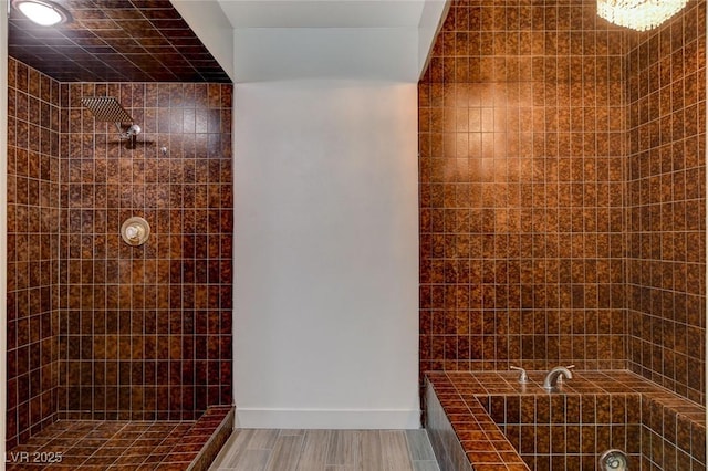 945 Vegas Valley Dr, Las Vegas, NV 89109 - full bathroom with tiled shower, wood finished floors, tiled bath, and baseboards
