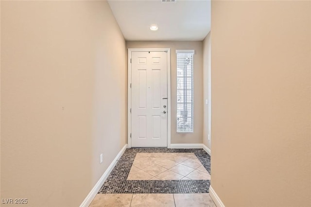 10121 Iron Wood Peak Ave, Las Vegas, NV 89166 - entrance foyer with light tile patterned flooring, baseboards, and recessed lighting