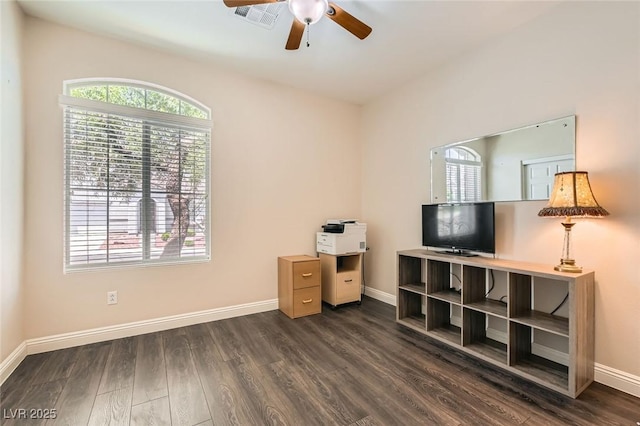 10121 Iron Wood Peak Ave, Las Vegas, NV 89166 - unfurnished office featuring ceiling fan, dark wood finished floors, and baseboards