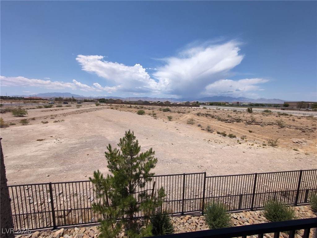 5669 Steampunk St, Las Vegas, NV 89118 - view of yard featuring a mountain view and a view of countryside