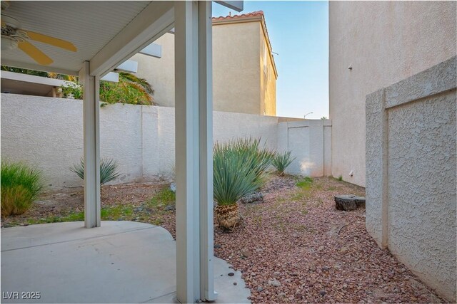 3331 Cheltenham St, Las Vegas, NV 89129 - view of yard with a ceiling fan and a patio