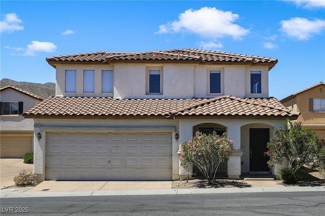 3961 Bayamon St, Las Vegas, NV 89129 - mediterranean / spanish home with stucco siding, an attached garage, a tiled roof, and driveway