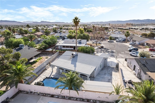 5453 Yvonne Cir, Las Vegas, NV 89122 - aerial view of residential area with mountains and a pool