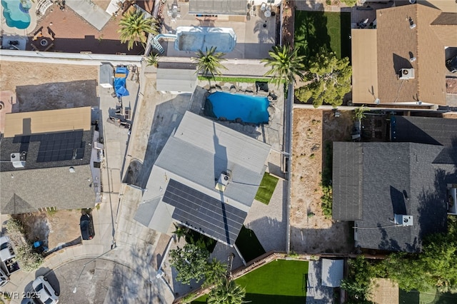5453 Yvonne Cir, Las Vegas, NV 89122 - aerial perspective of suburban area with a pool