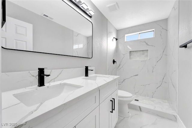 5453 Yvonne Cir, Las Vegas, NV 89122 - full bath with double vanity, marble finish flooring, and a marble finish shower