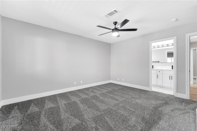 5453 Yvonne Cir, Las Vegas, NV 89122 - unfurnished bedroom with carpet floors, a ceiling fan, and ensuite bath