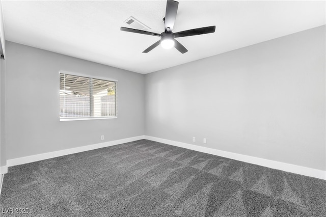 5453 Yvonne Cir, Las Vegas, NV 89122 - empty room with dark colored carpet and a ceiling fan